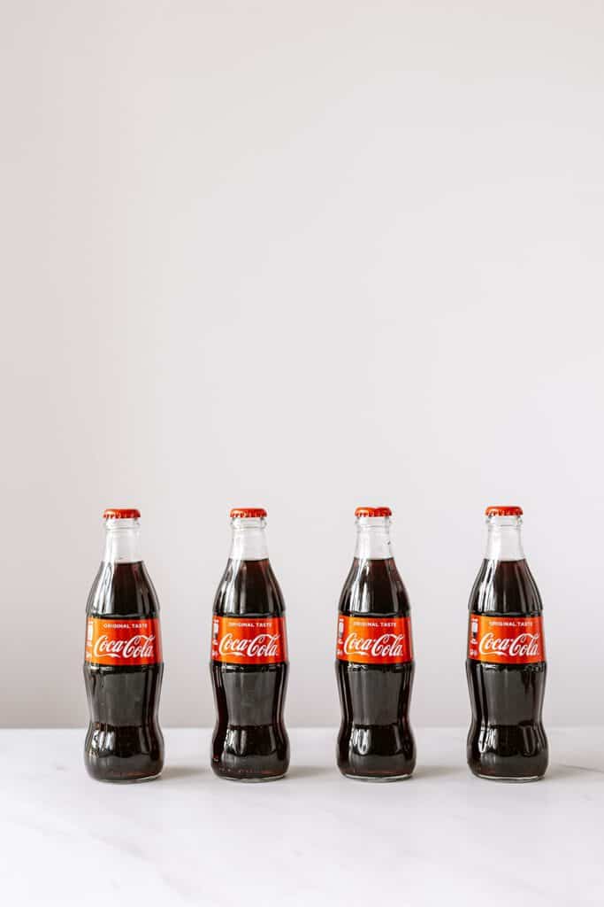 coca cola bottles show off its timeless brand